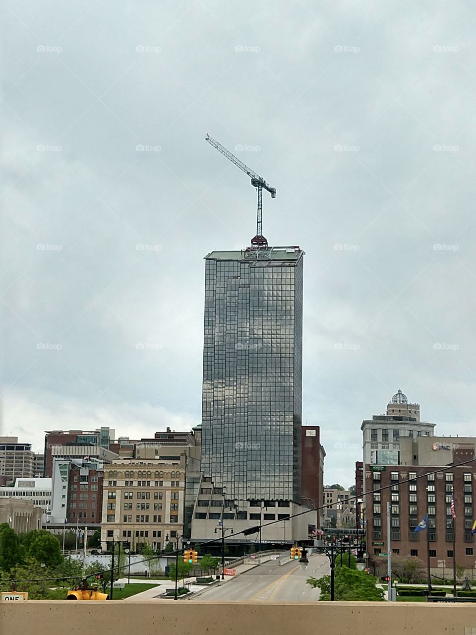 Crane on top of building