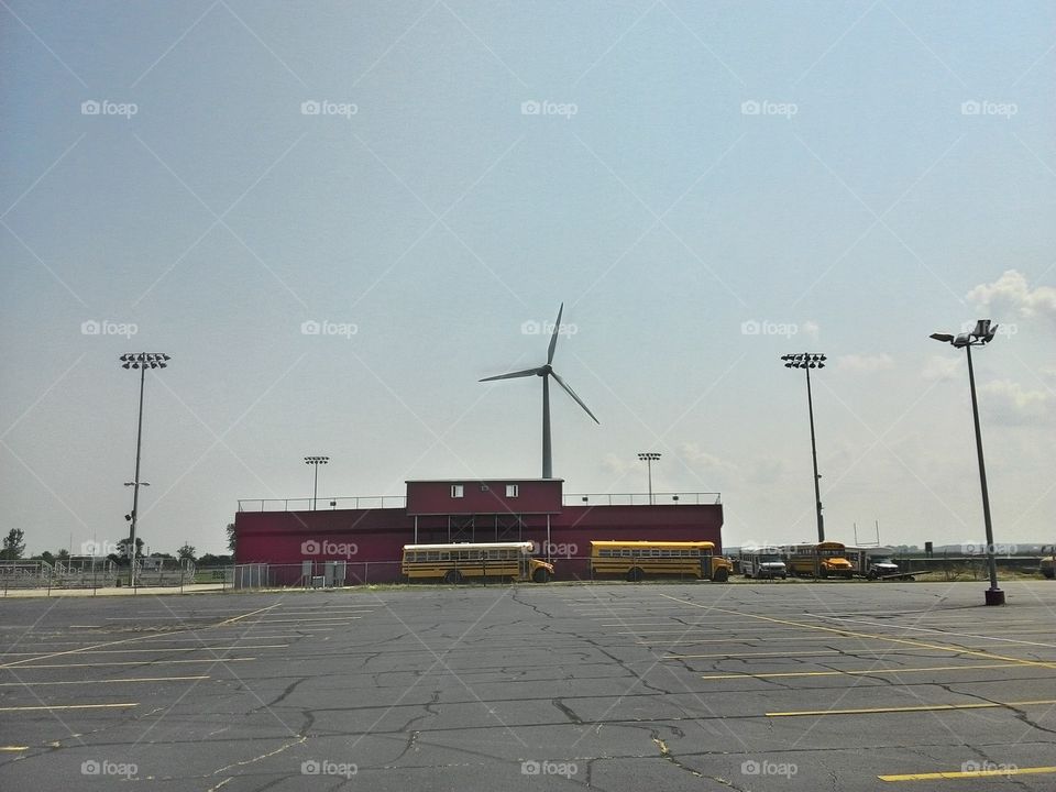 wind power for school. a wind turbine powering a school