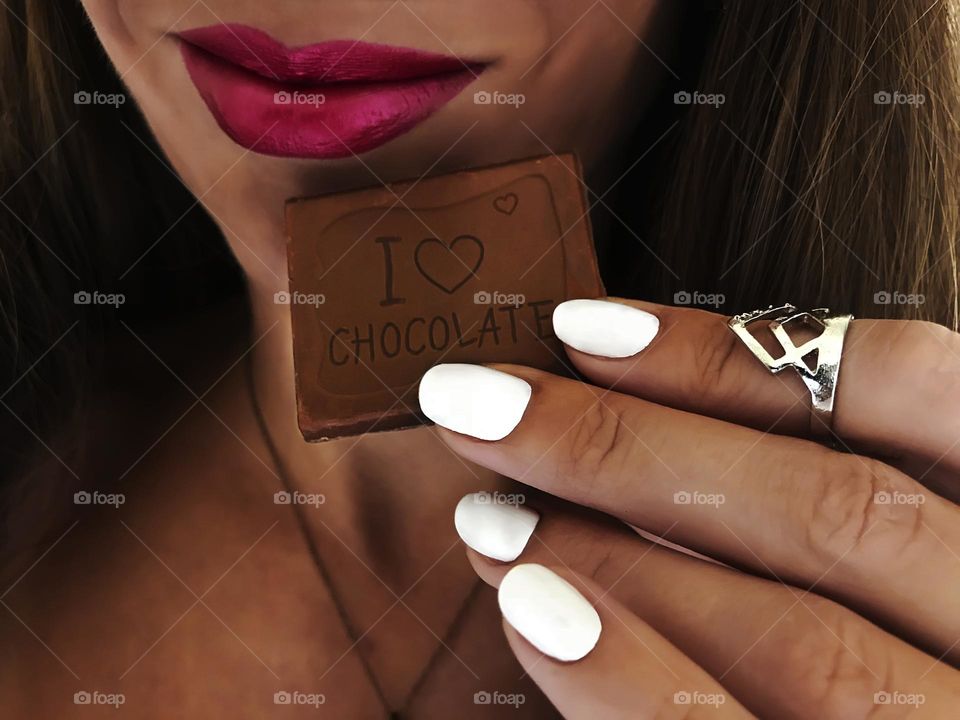 White manicure and chocolate 