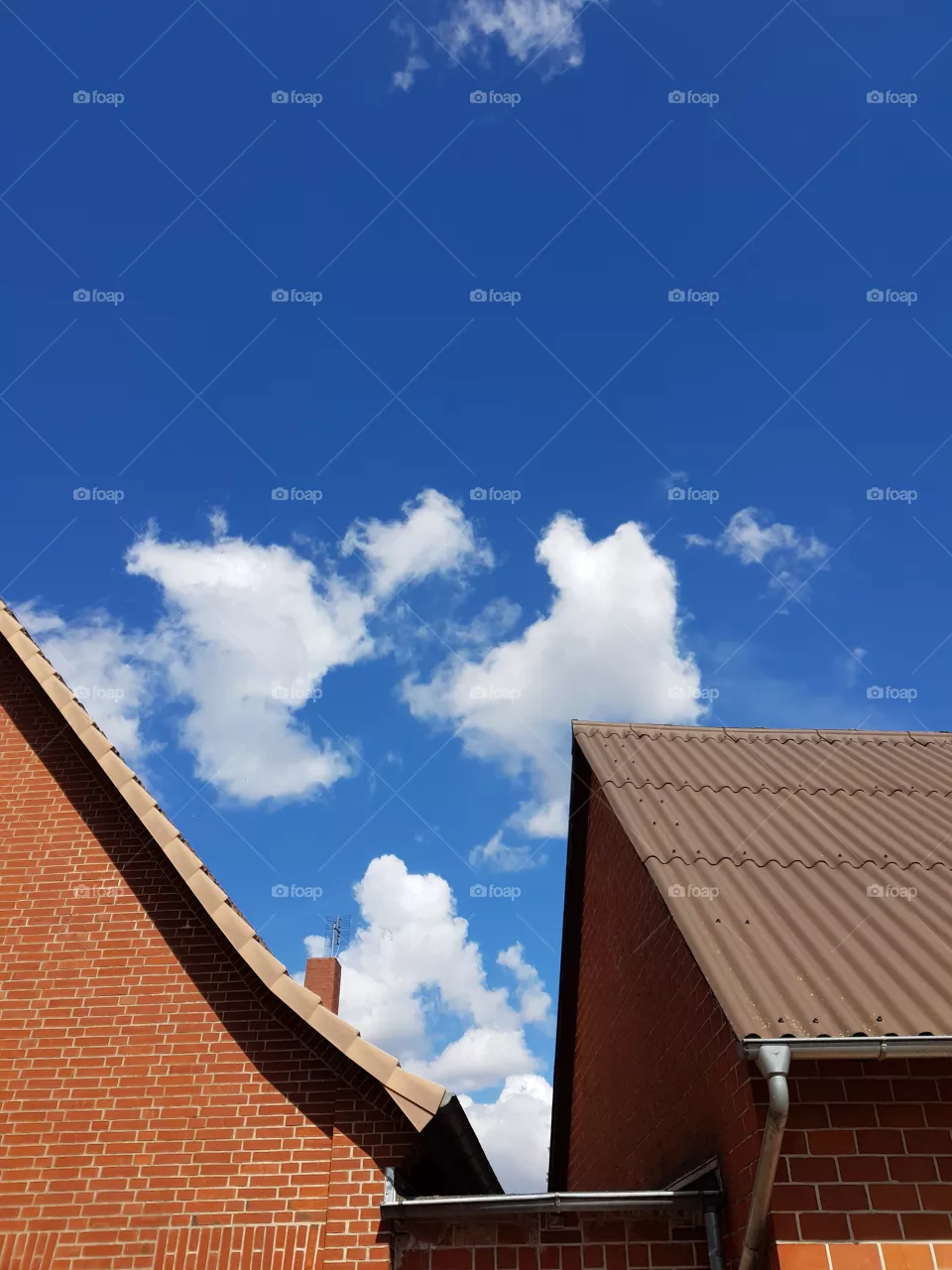 Funny clouds on the rooftop