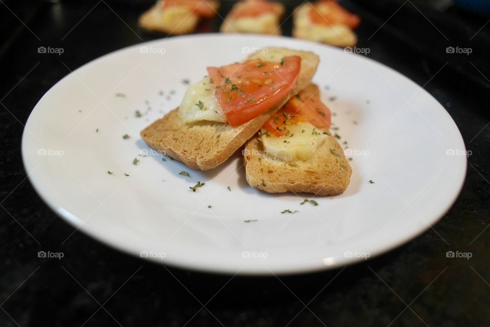 Tomato and cheese on toast 