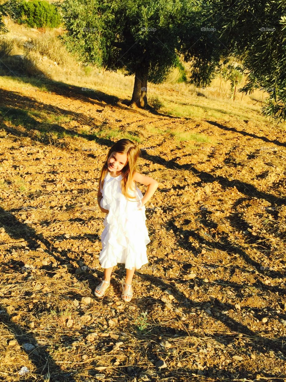 Cute girl standing in farm