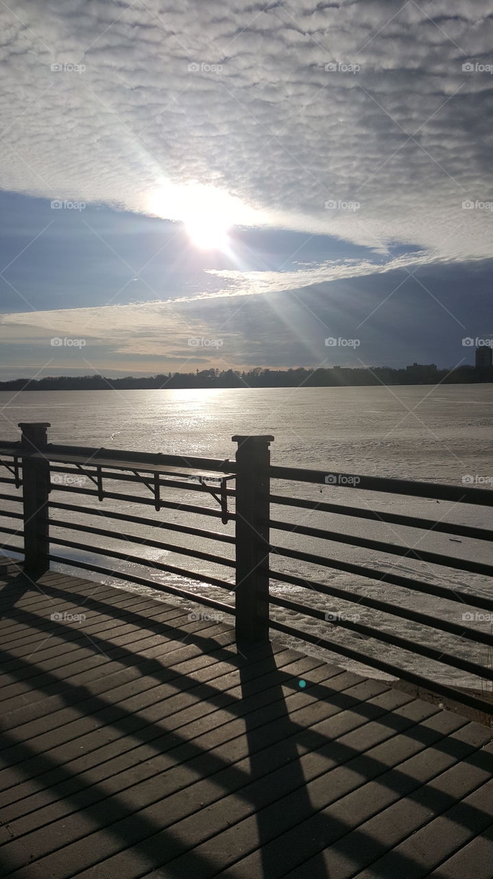 Ice Melting on Lake Calhoun - Minneapolis Minnesota - Sun Setting