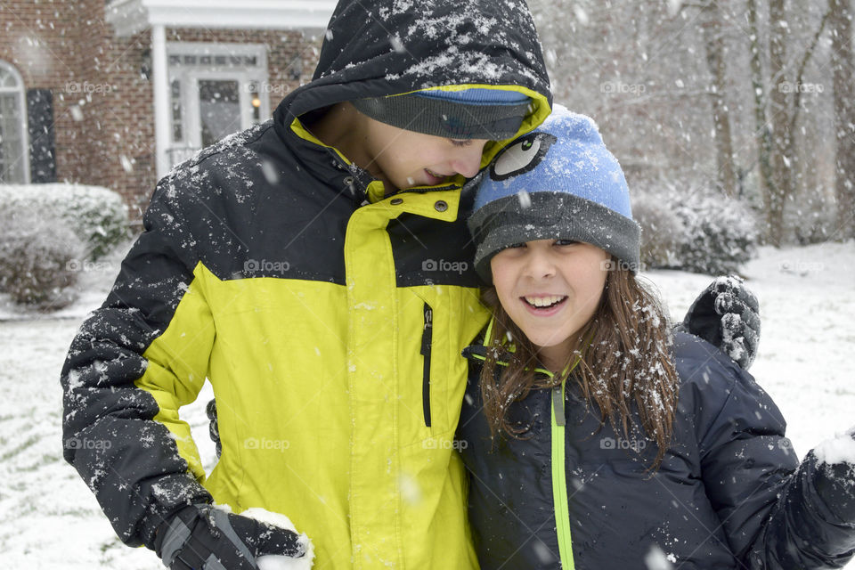 Sibling Love in the Snow 