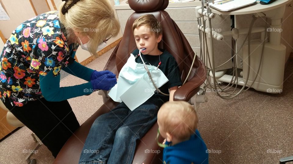 teeth cleaning. 6year old getting his teeth cleaned