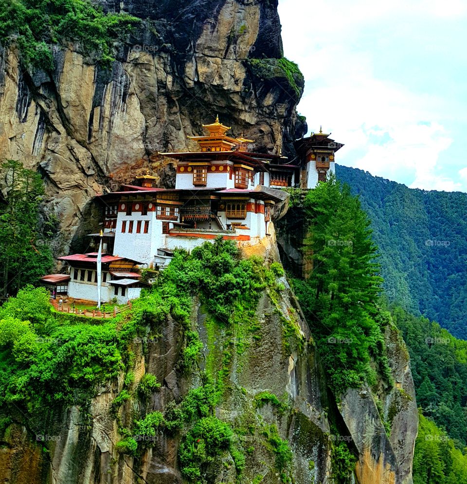 Paro Taktsang, a popular MONASTERY in Bhutan known to outside world as the Tiger Nest is one of the fascinating sight in the World. In 8th century,  Guru Rinpoche who meditated in the cave where Taktsang MONASTERY stands today has flown from Tibet at the back of the flying tigress. Today Taktsang has become one of the top attraction for tourists visiting Bhutan.