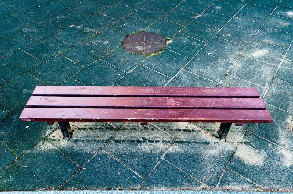 A wooden bench and a hatch cover.