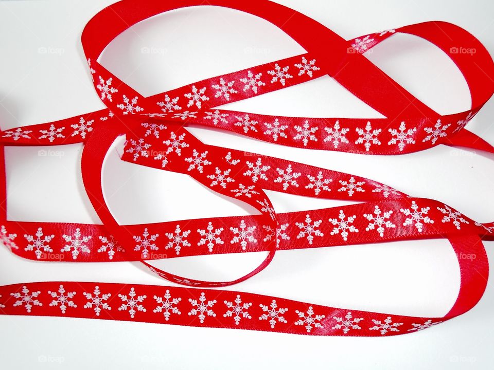 Christmas red ribbon with snowflakes 