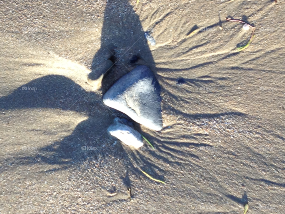 shadows pebbles sandy sweeping by Ellis