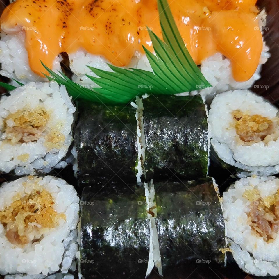 assorted sushi served in a container