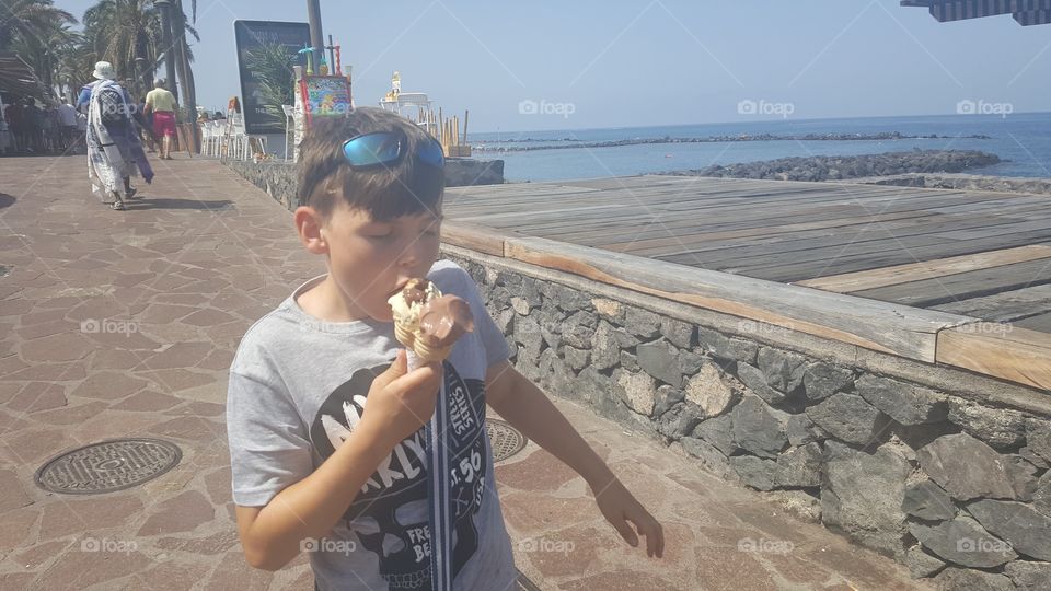 Enjoying an ice cream at the seaside