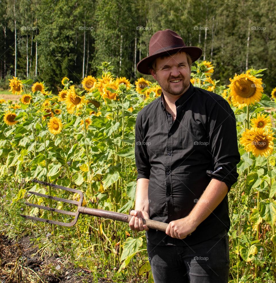 A man in the countryside, working and resting, after a while we photography skills. Falltime