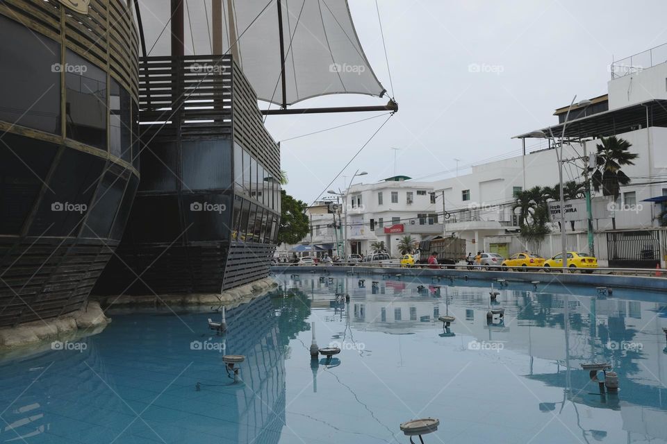 Ecological swimming pool in a central park in the city of Machala, Ecuador.