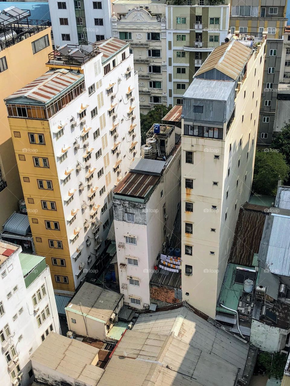 Architecture of Ho Chi Minh, tall narrow rectangle shaped buildings from above 