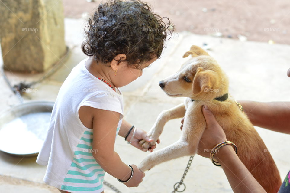 Baby and puppy.