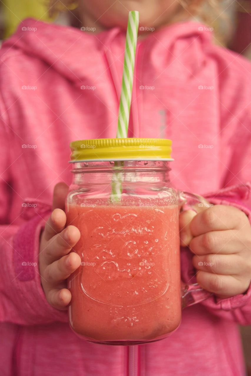 Smoothy in the girl's hands