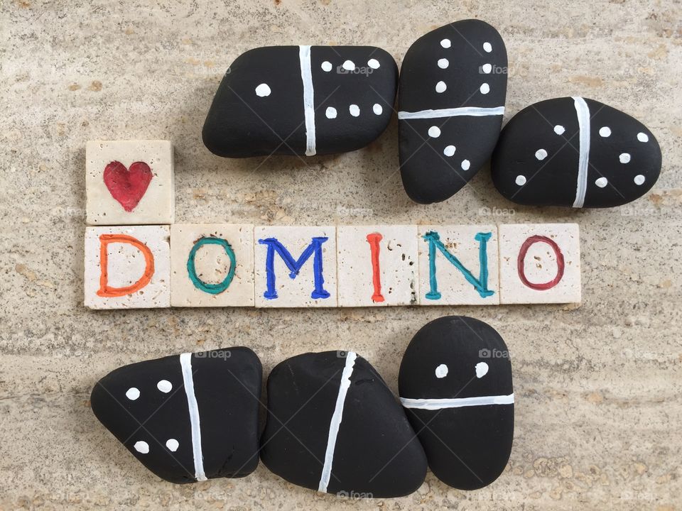 Domino game concept on stones