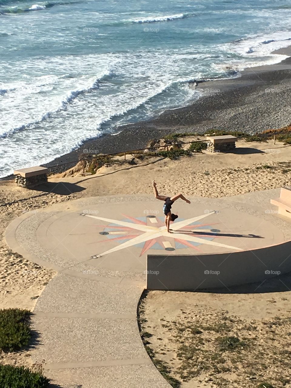 Gymnast at the beach