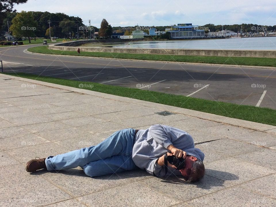 Photographer lying down for better angle