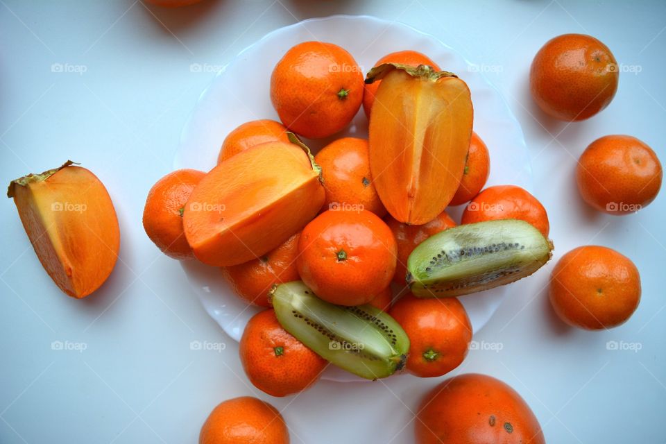 fresh tropics fruits top view white  background