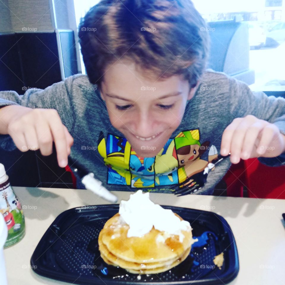 my son eating pancakes