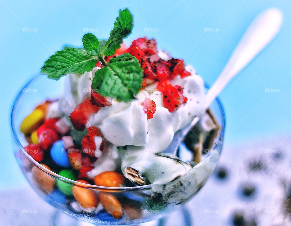 Close-up of ice cream bowl with candy