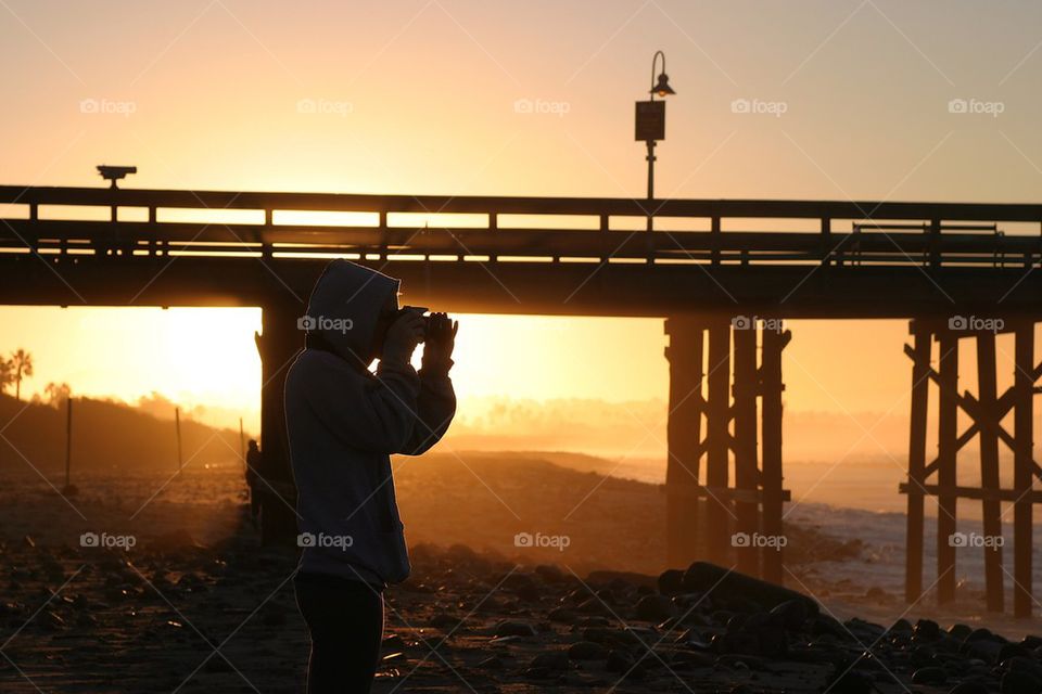 Photographer At Sunset