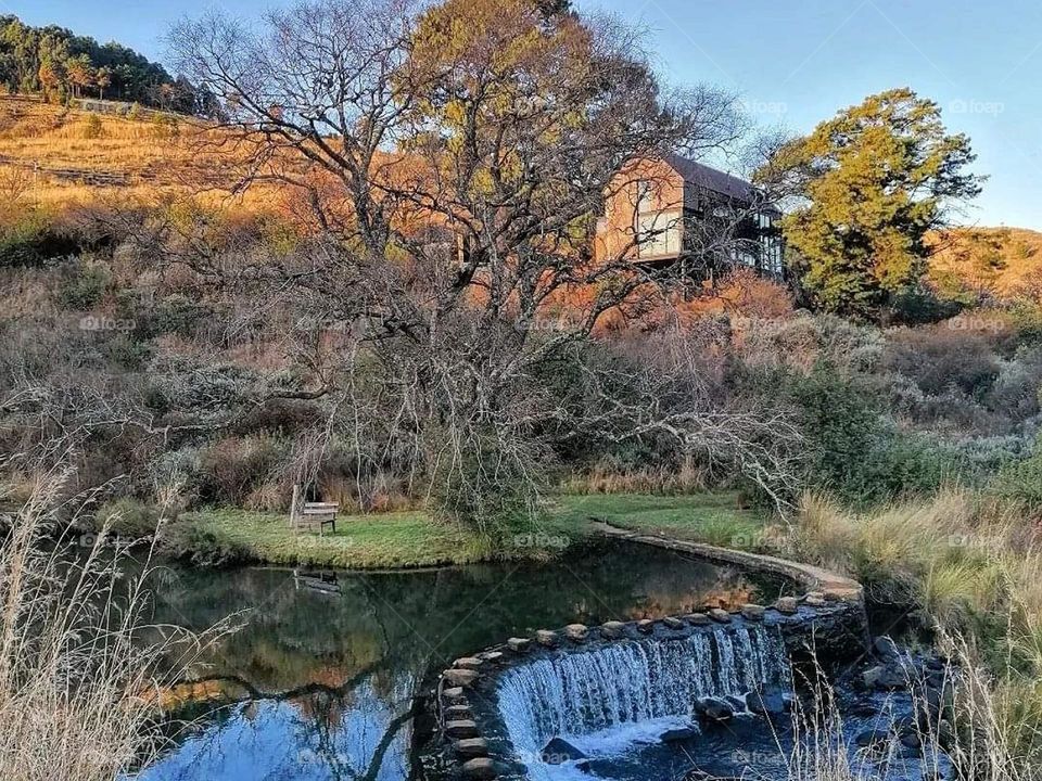 Old house next to stream