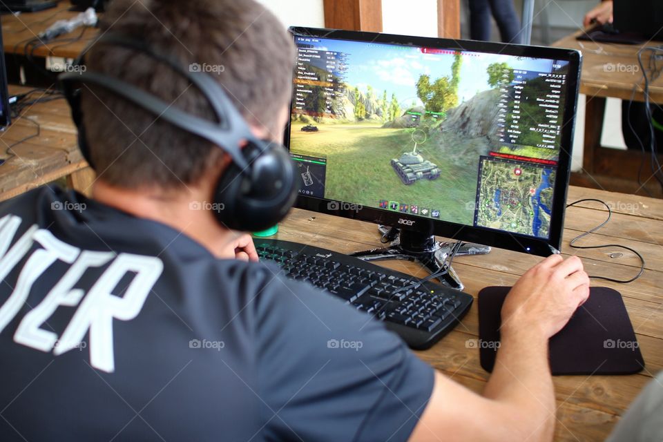 Game testing. Man playing the game