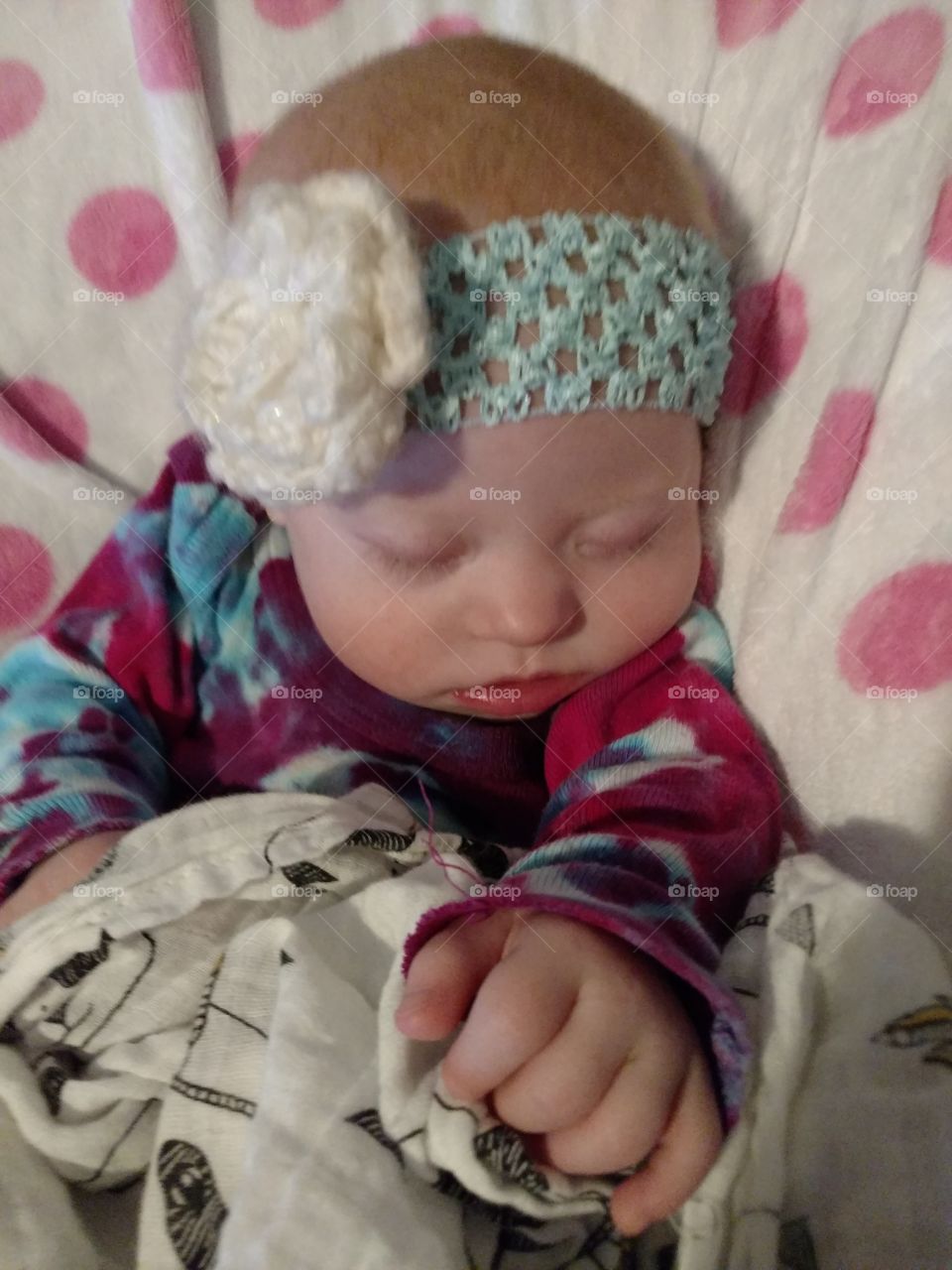 Cute baby sleeping on bed