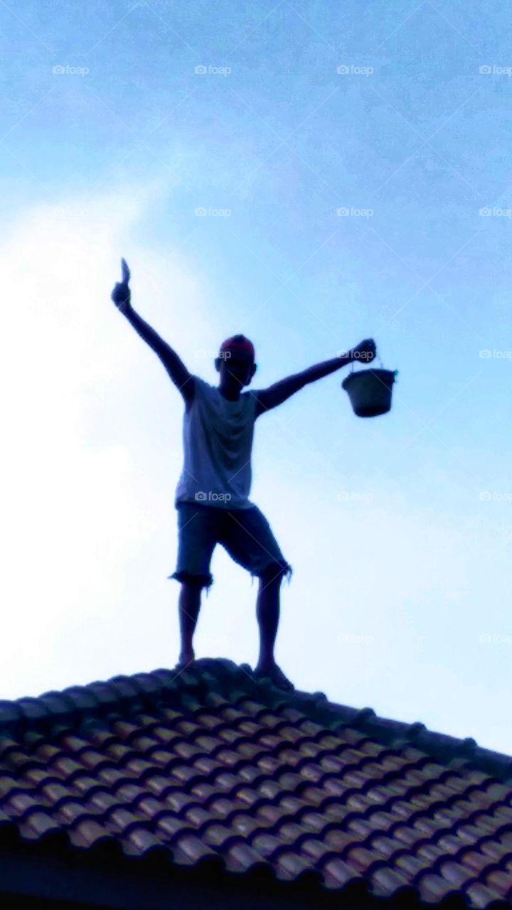 The person above is precarious