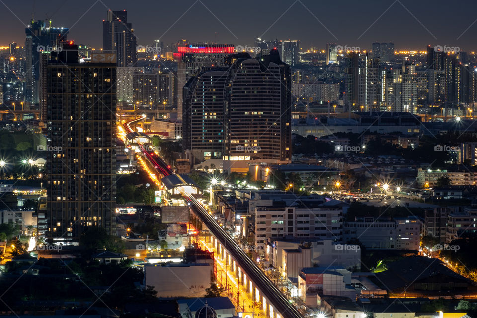 Thailand-July 21 2020:Beautiful Night shot of BTS station and skyscraper in Bangkok