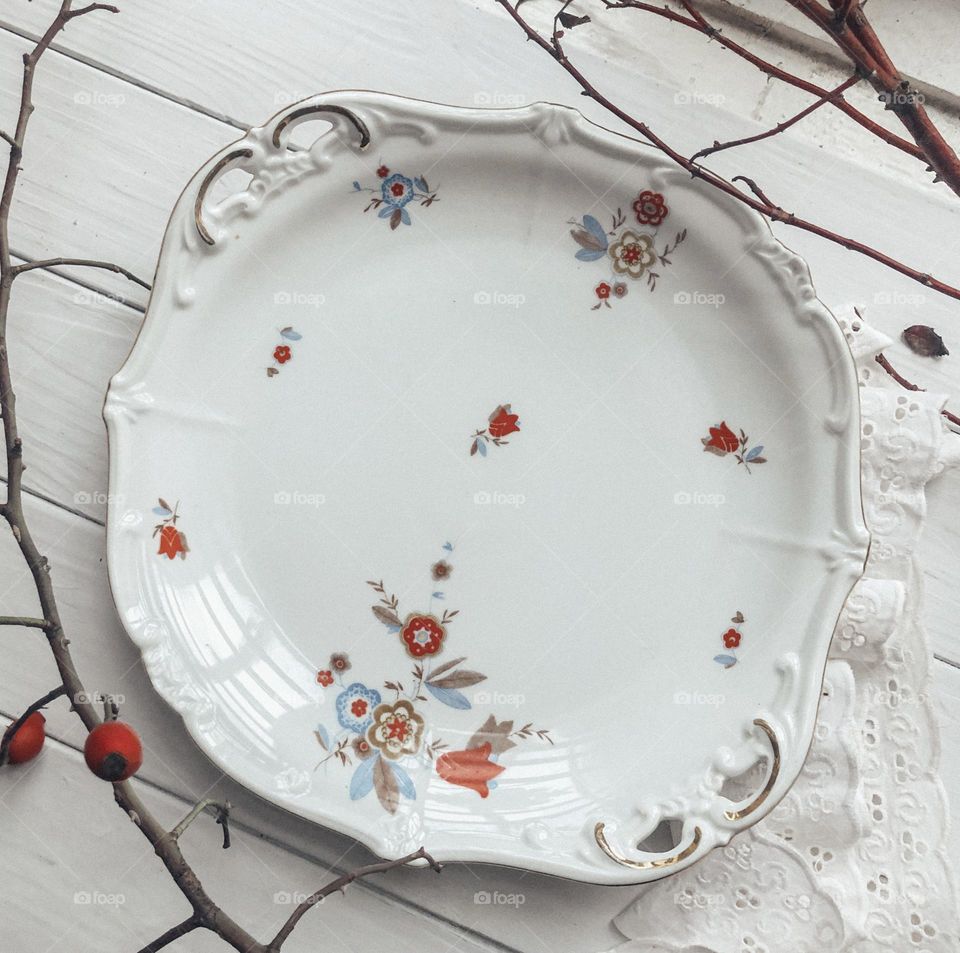 Vintage porcelain dish with flowers and handles