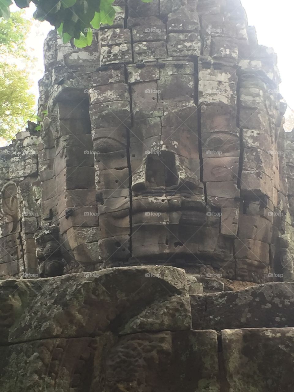 A Missing Nose of Cambodian Ruins of a Hindu Temple from The 12th Century. 