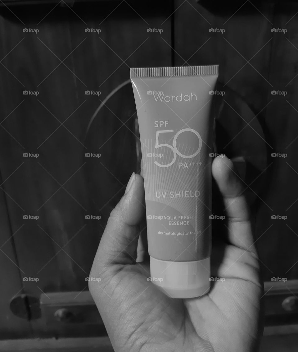 Beauty product image hand isolated, in white and black