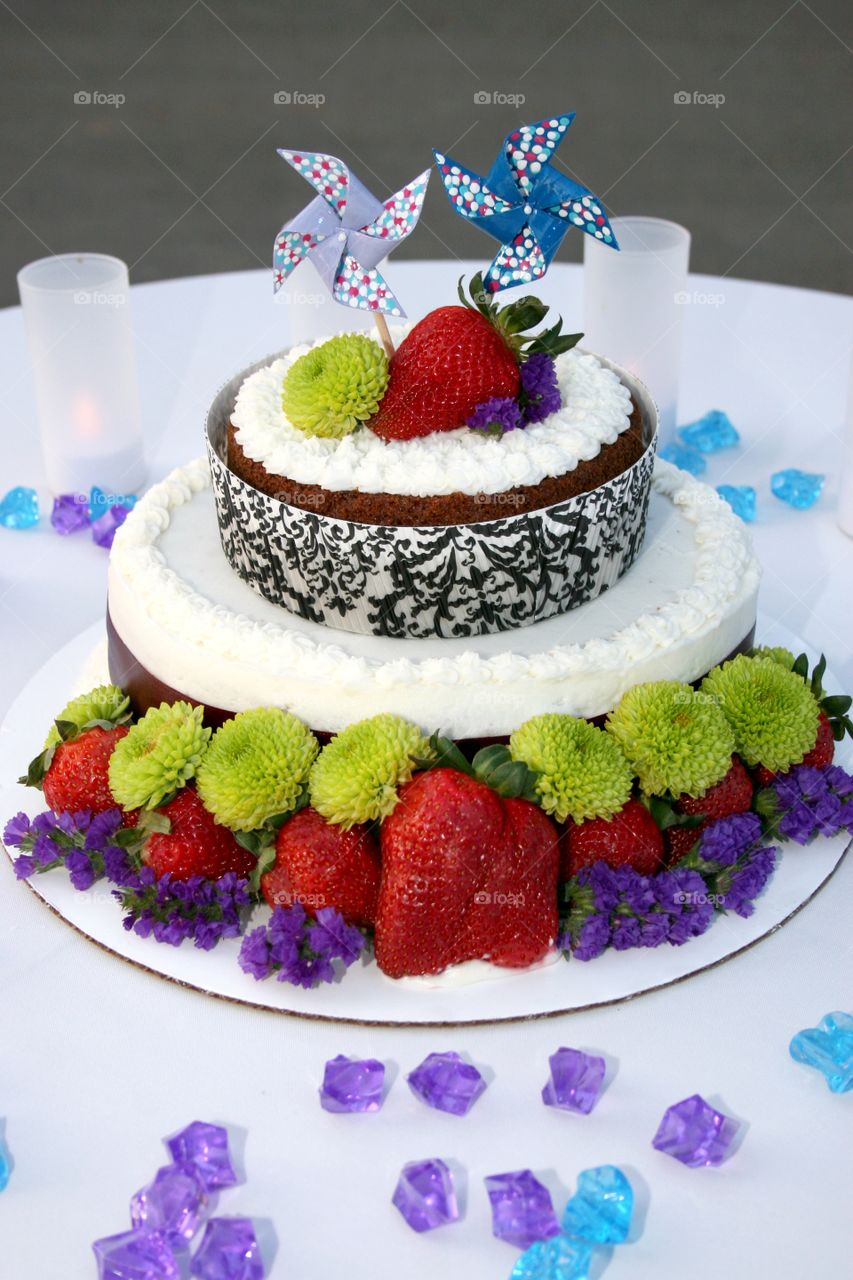 Tasty fruit cake on table