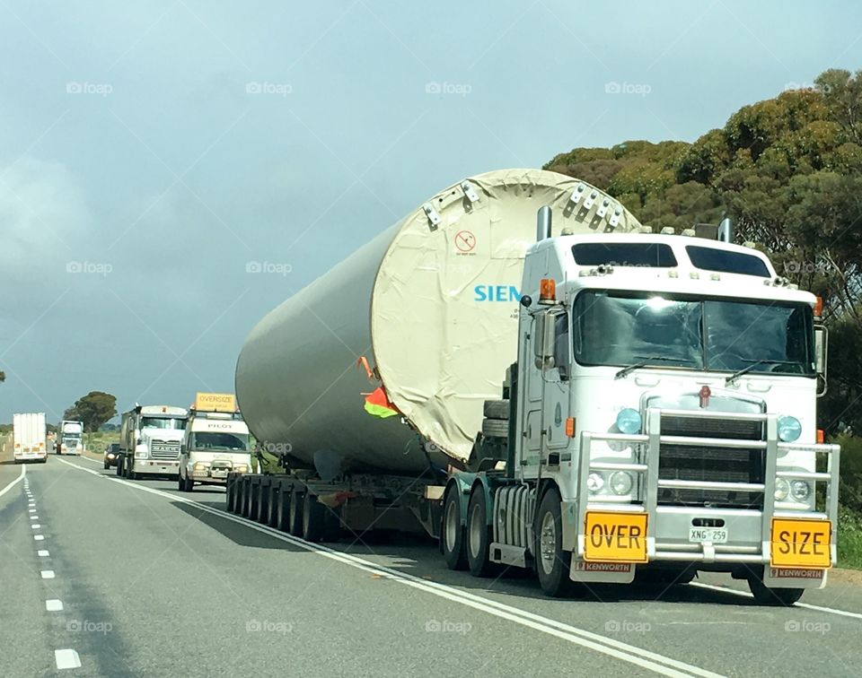 Large truck lorrie carrying big tank