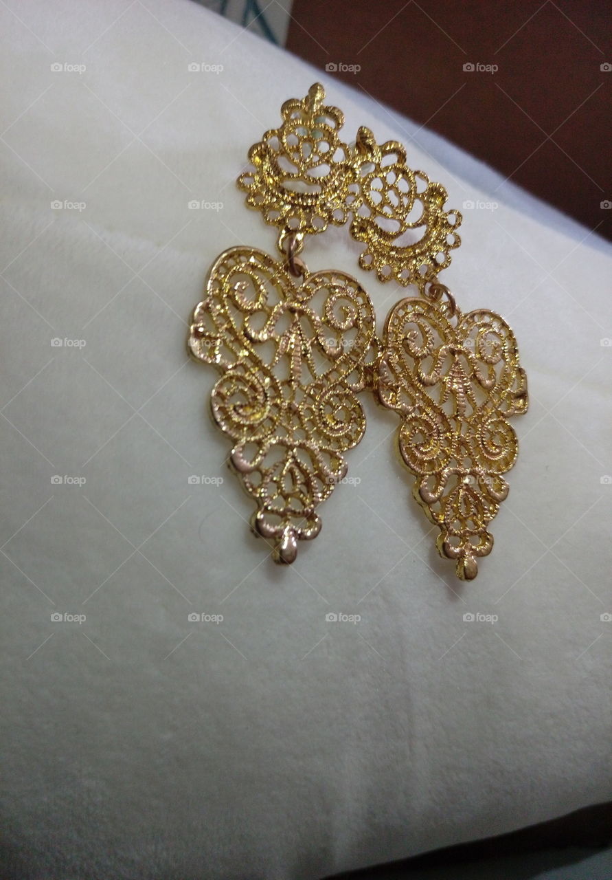 glamourous and beautiful pair of golden earings
