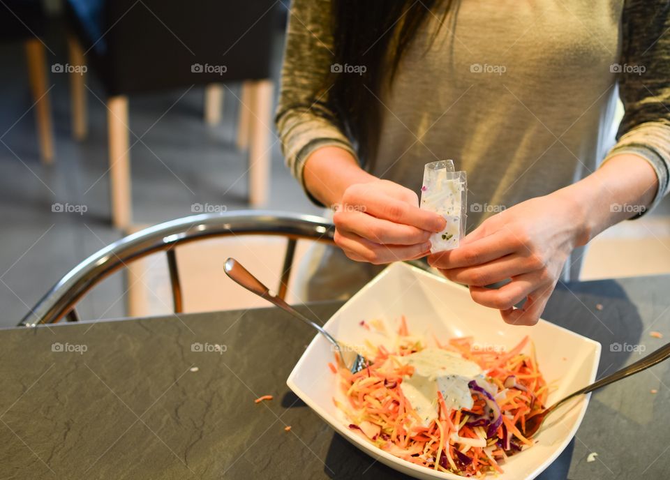 Mid section of person preparing food