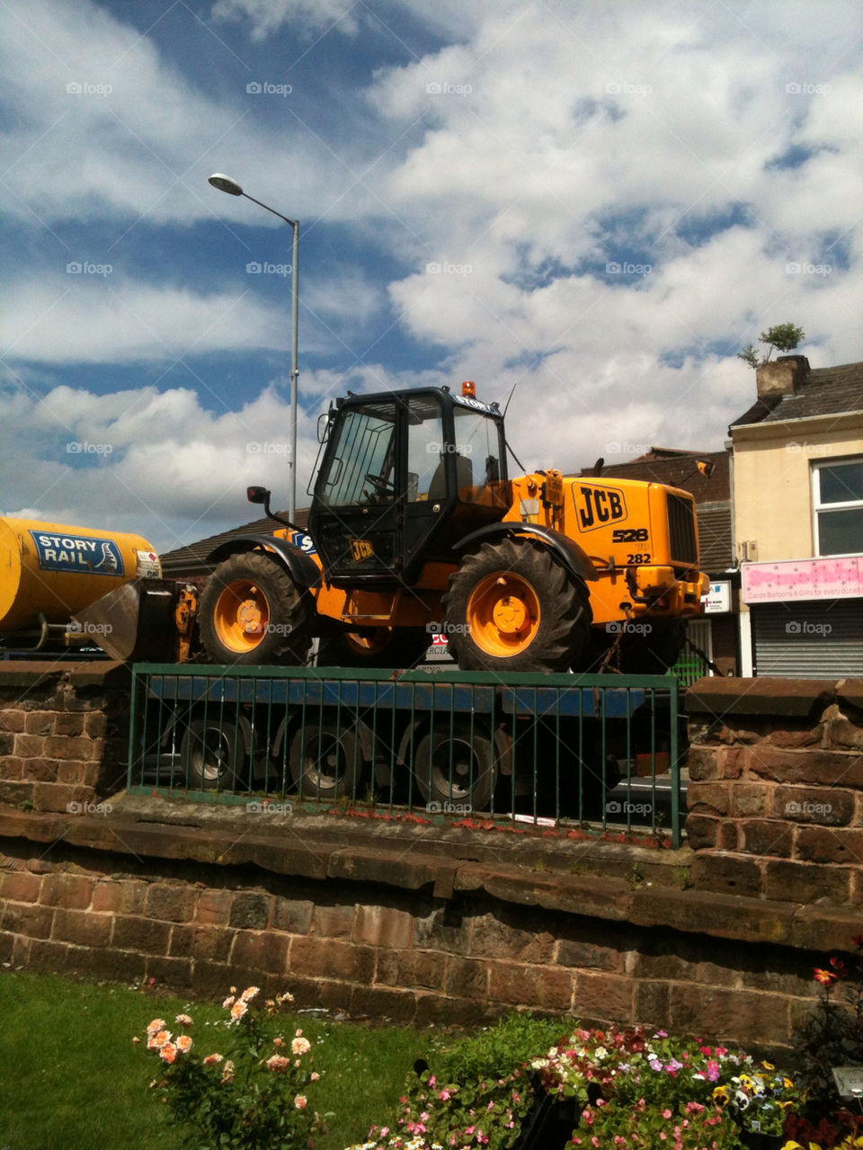 yellow wall construction building by gregmanchester