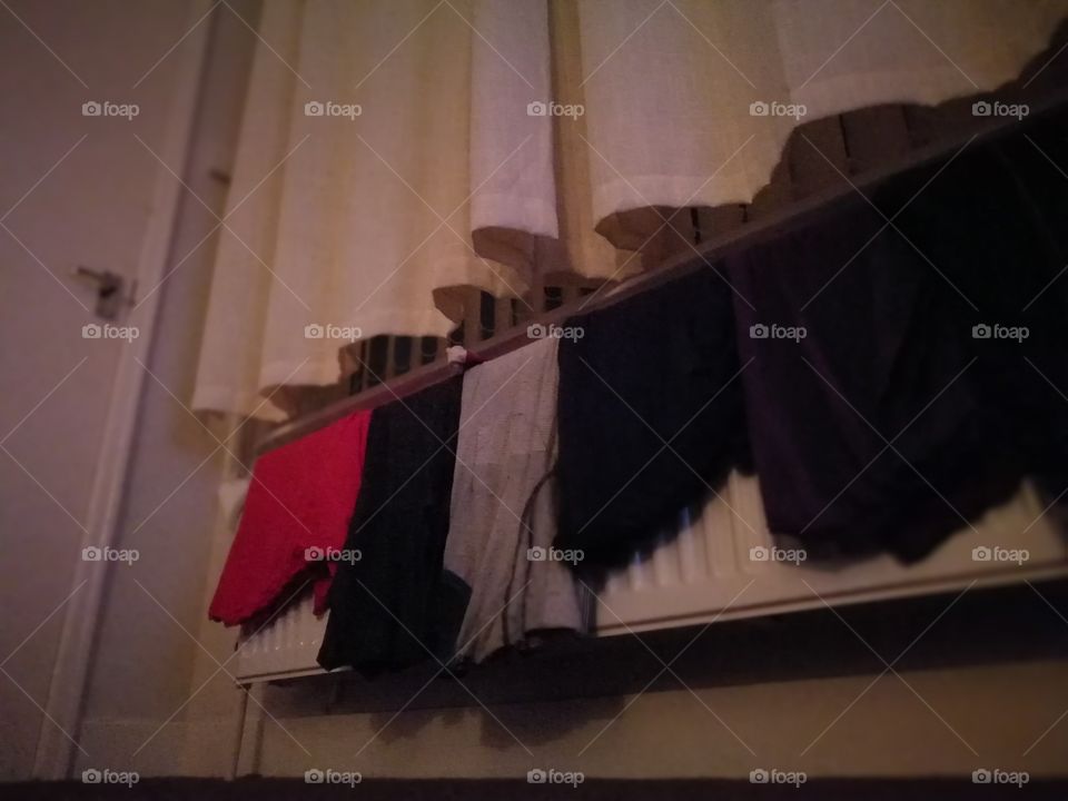clothes drying on radiator
