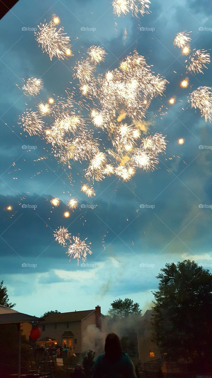 Fireworks at dusk