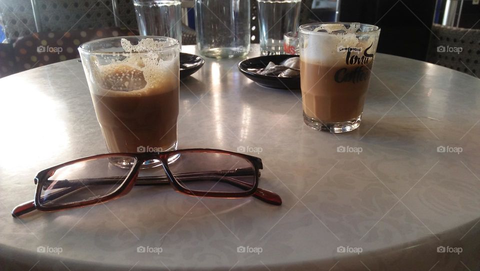 cups of coffee and my glasses.