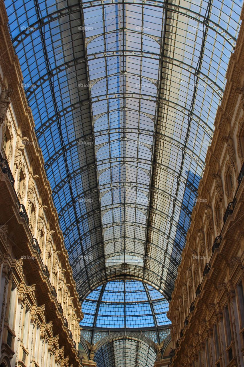 Neo-Renaissance style fasade and roof details of Galeria Vittorio Emanule in Milan.  Italy