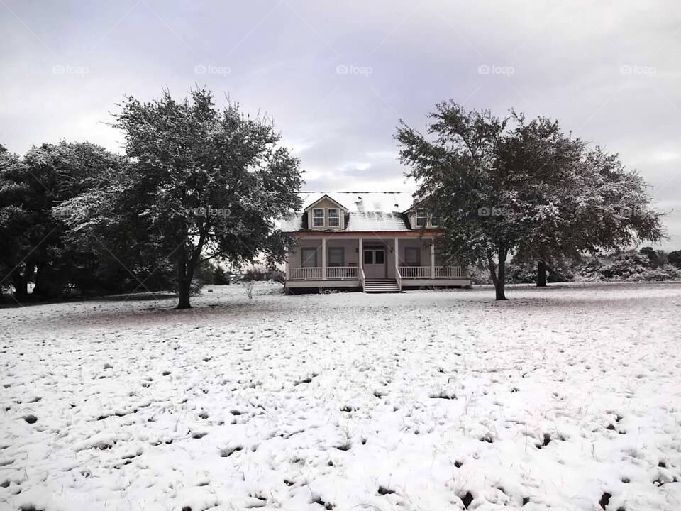 Farmhouse in the snow 