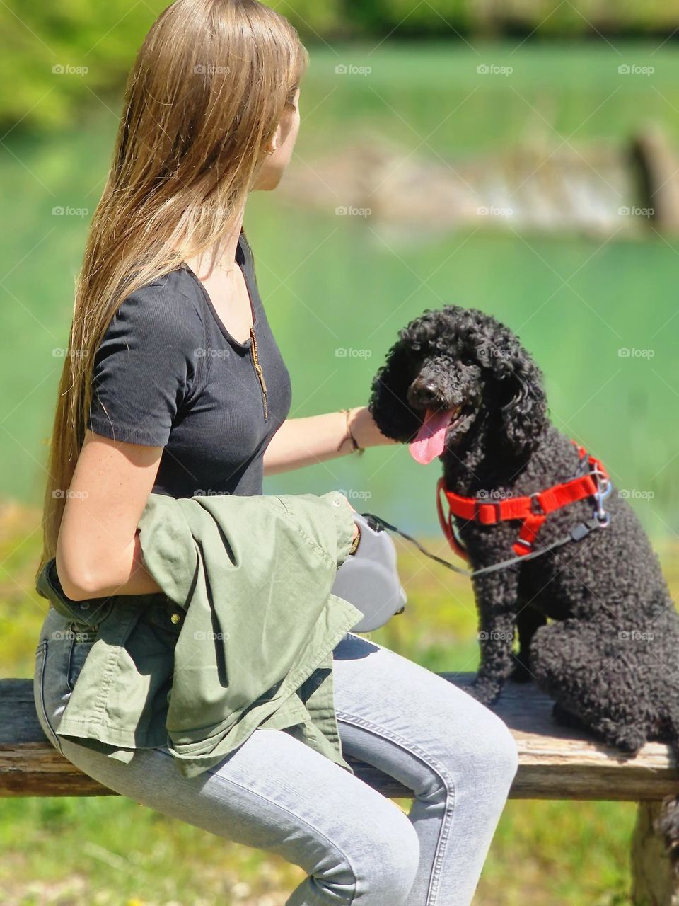 young girl walking the dog