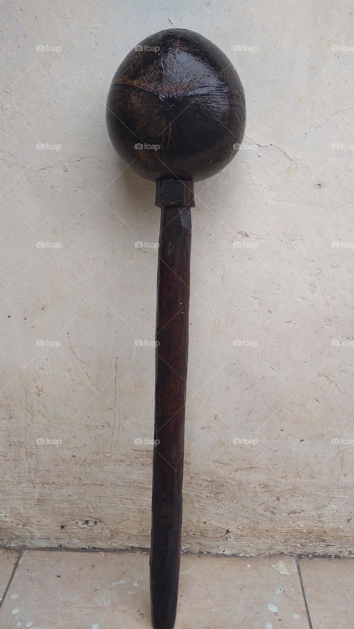 The ancient dipper is made of coconut skin and wood