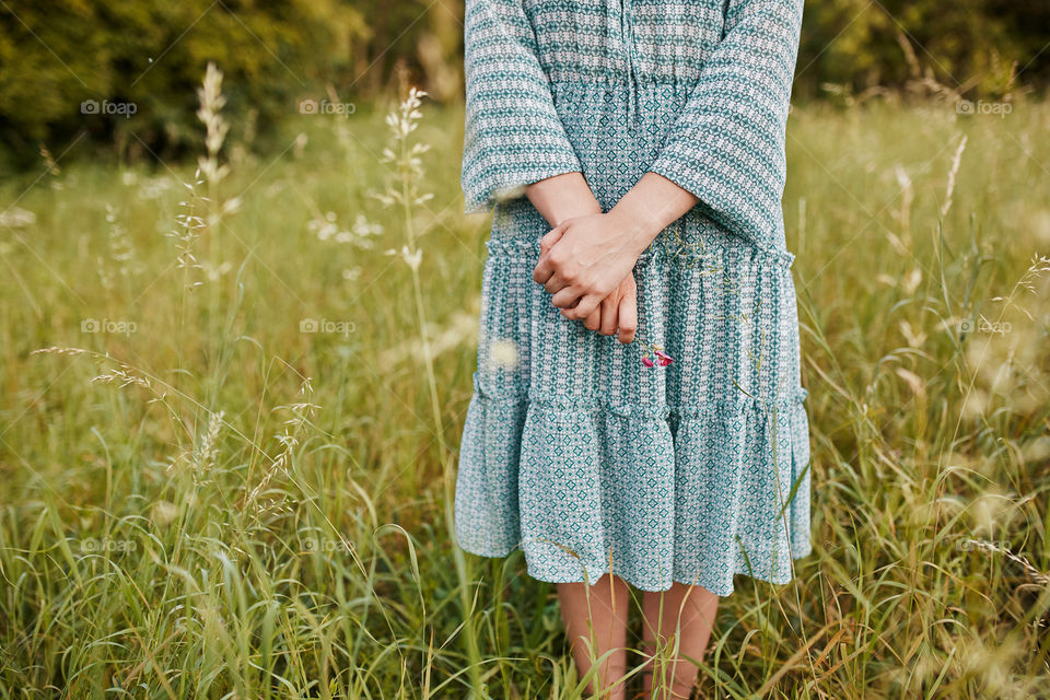 Spring romantic . Beauty romantic woman holding a spring flower in hand 