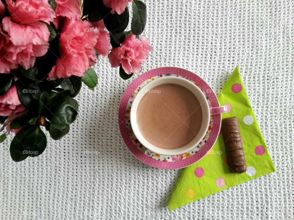 High angle view of coffee with chocolate bar
