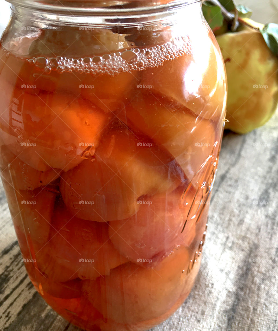 Canned nectarines in canning jar